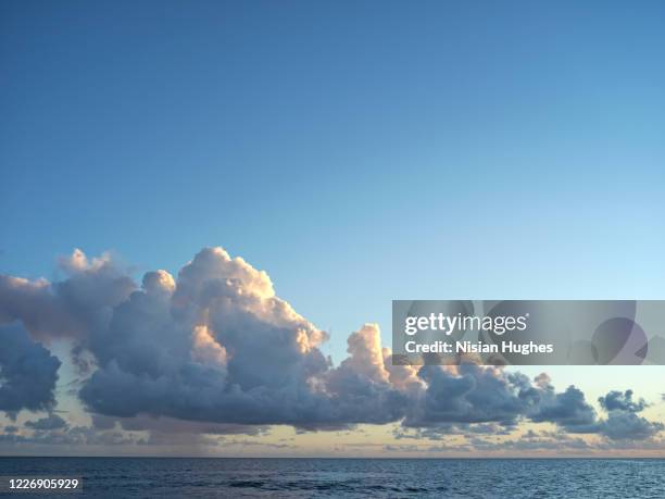 looking over coast of martinique looking out over the ocean at sun setting - franse overzeese gebieden stockfoto's en -beelden