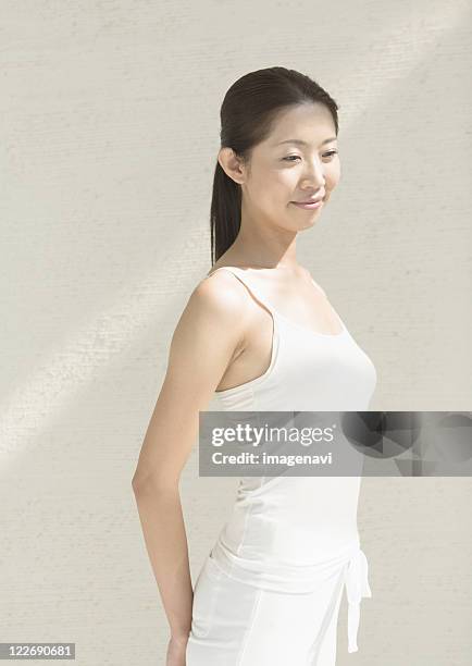 a young woman - camisola stock-fotos und bilder