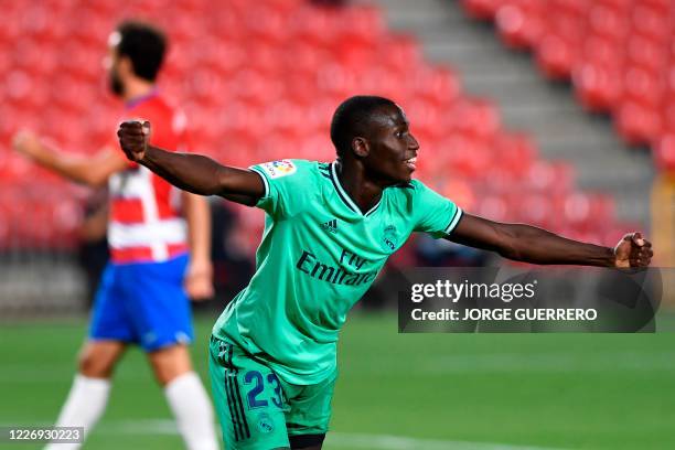 Real Madrid's French defender Ferland Mendy celebrates after scoring during the Spanish league football match Granada FC vs Real Madrid CF at Nuevo...