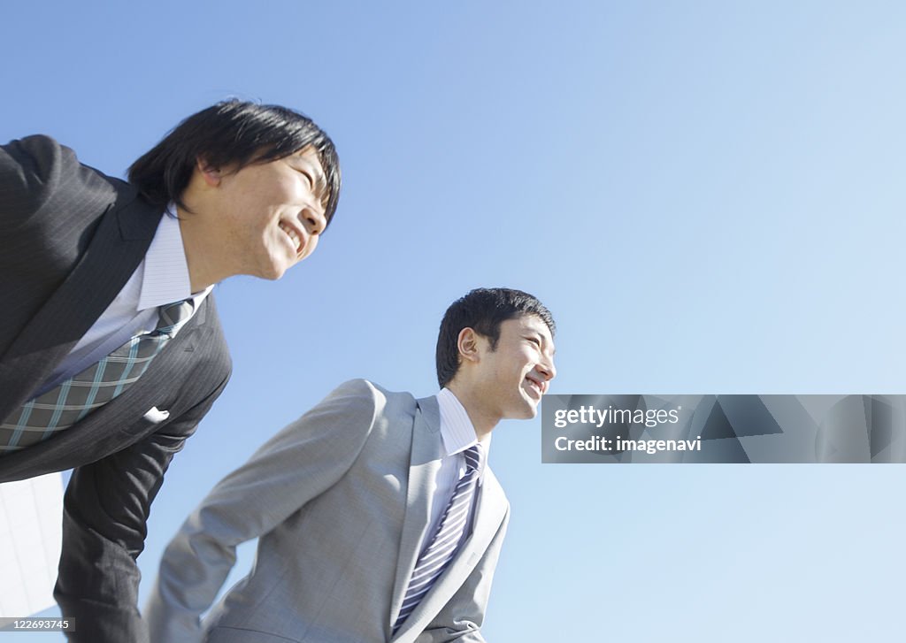 Smiling businessmen