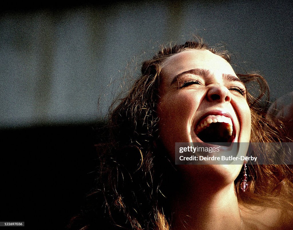 Girl laughing high