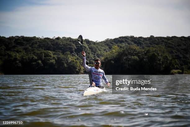 Brazilian paralympic kayak athlete Caio Ribeiro exercises during a training session in Vila Jurubatuba amidst the coronavirus pandemic on July 12,...