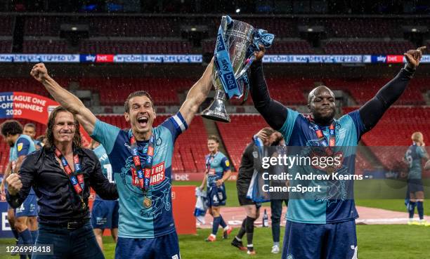 Wycombe Wanderers' Gareth Ainsworth , Matthew Bloomfield and Adebayo Akinfenwa during the Sky Bet League One Play Off Final between Oxford United and...