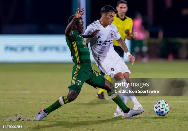 Los Angeles Galaxy forward Cristian Pavon shoots the ball during the MLS Is Back Tournament between the LA Galaxy v Portland Timbers on July 13, 2020...