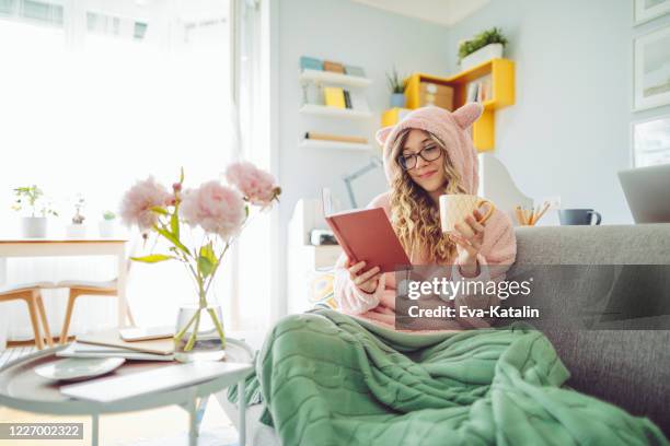 at home - bear suit stock pictures, royalty-free photos & images