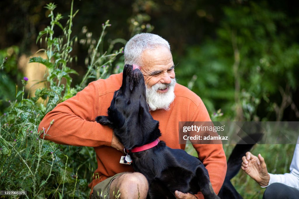 Active Senior Man with his Dog