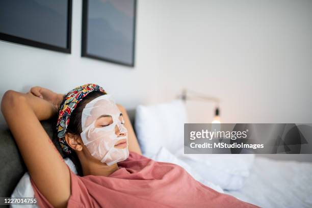 spa day. - beauty mask stock pictures, royalty-free photos & images