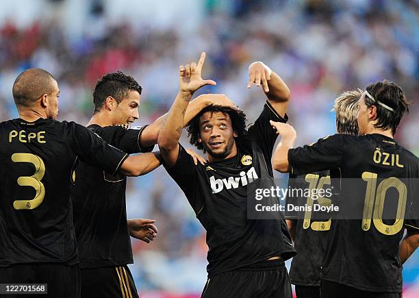 Marcelo of Real Madrid celebrates after scoring Real's 2nd goal during the La Liga match between Real Zaragoza and Real Madrid at estadio La Romareda...