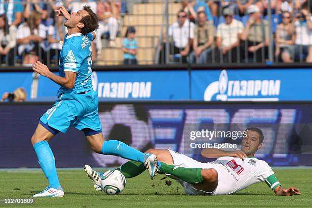 Danko Lazovic of FC Zenit St. Petersburg in action against Aleksandr Amisulashvili of FC Krasnodar during the Russian Football League Championship...