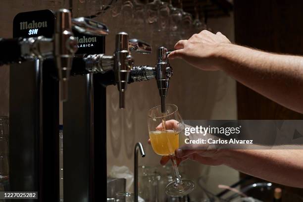 Dani Garcia taps a beer in his restaurant Casa Dani on May 25, 2020 in Madrid, Spain. Some parts of Spain have entered the so-called "Phase One" or...