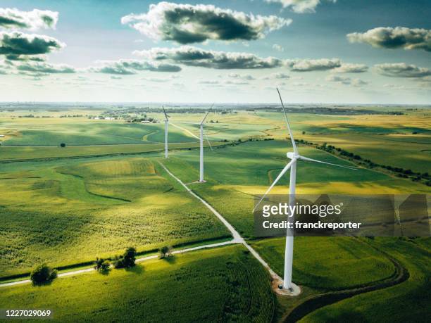 wind turbine farm aerial view - environmental issues stock pictures, royalty-free photos & images
