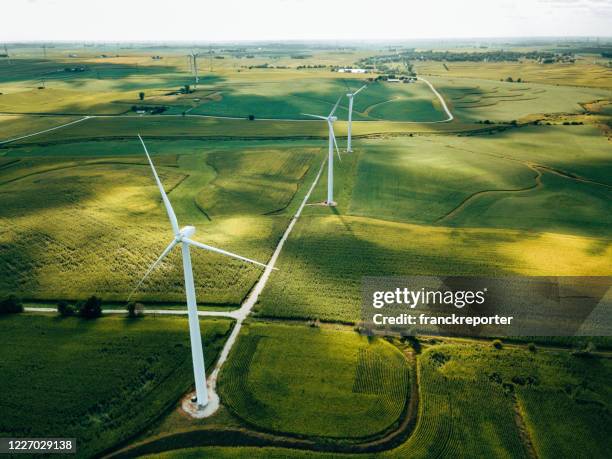 wind turbine farm aerial view - clean air stock pictures, royalty-free photos & images