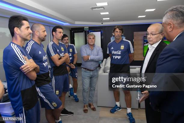 Alejandro Sabella former head coach of Argentina speaks as Claudio Tapia president of AFA, Lionel Scaloni head coach of Argentina and his assistants...