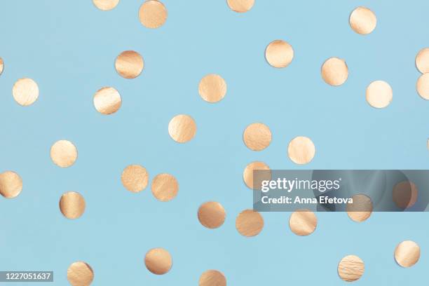 beautiful golden confetti - gold confetti stock-fotos und bilder