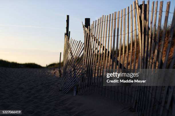 Erosion fencing on Race Point Beach on May 25, 2020 in Provincetown, Massachusetts. Massachusetts has begun Phase 1 of reopening after the...