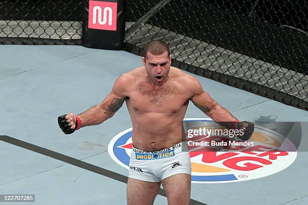 Mauricio Shogun celebrates after defeating Forrest Griffin in a light heavyweight bout at UFC 134 at HSBC Arena on August 27, 2011 in Rio de Janeiro,...