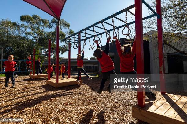 Students play at recess at Lysterfield Primary School on May 26, 2020 in Melbourne, Australia. Students from prep to year two and years 11 and 12 are...