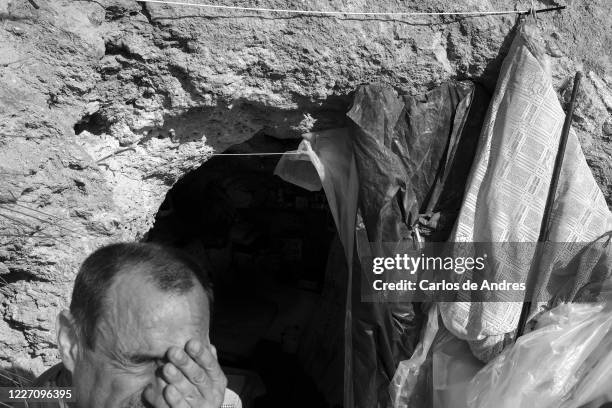 Jose, unemployed and homeless bricklayer in an old buker from the Spanish civil war that he uses as a home on May 23, 2020 in Aranjuez, Spain. Some...