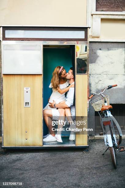 this photo booth has so many love stories to tell - kiss & tell stock pictures, royalty-free photos & images