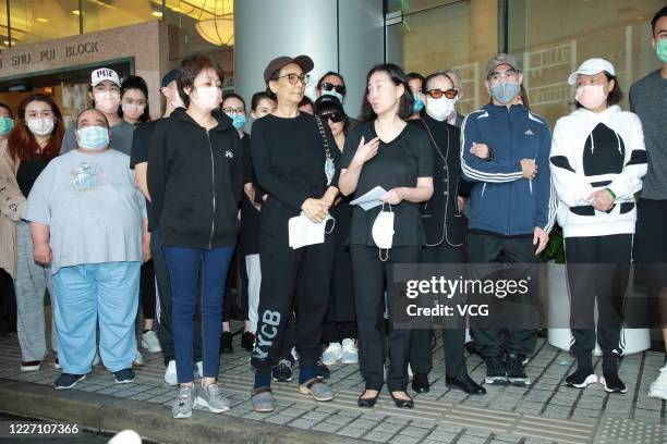 Family members of Macao casino tycoon Stanley Ho Hung-sun speak to media outside Hong Kong Sanatorium and Hospital where Stanley Ho died on May 26,...