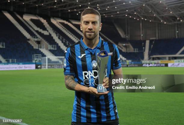 Alejandro Gomez of Atalanta BC receives the MVP of the month June prize prior to the Serie A match between Atalanta BC and Brescia Calcio at Gewiss...