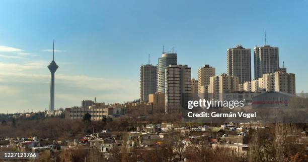 tehran modern city skyline under clouds, iran - tehran skyline stock pictures, royalty-free photos & images