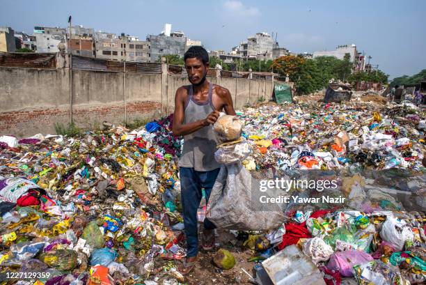 Indian Rag Pickers 431 Ragpicker Stock Photos, High-Res Pictures, and Images - Getty Images