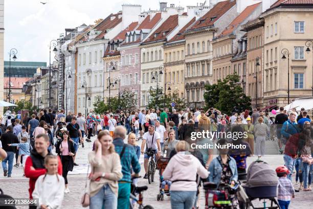 Tourists get back to the Old Town of Warsaw as Coronavirus lockdown is eased and people get back to normality on July 12 Warsaw, Poland. Social...