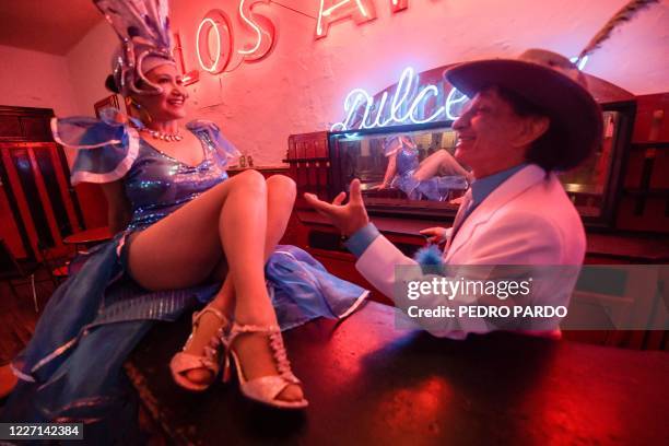 Mexican dancers Carlos Bueno and Patricia Rivera perform for the press at Los Angeles dance hall in Mexico City on July 10, 2020 amid the COVID-19...