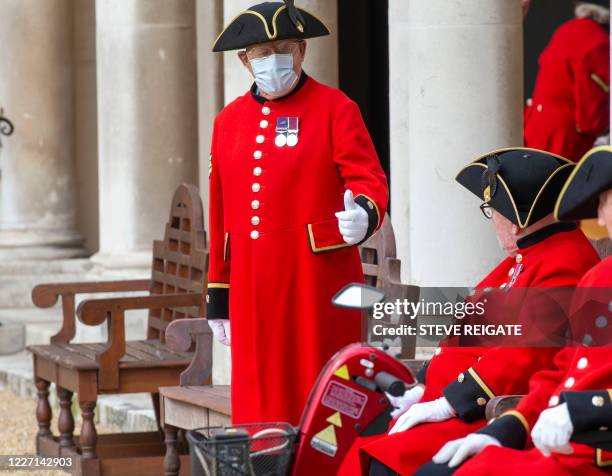 Britain's Camilla, Duchess of Cornwall reviews Chelsea Pensioners on parade during a visit to the Royal Hospital Chelsea in London on July 15, 2020....