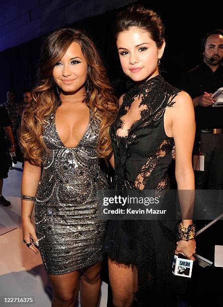 Demi Lovato and Selena Gomez arrive at the The 28th Annual MTV Video Music Awards at Nokia Theatre L.A. LIVE on August 28, 2011 in Los Angeles,...