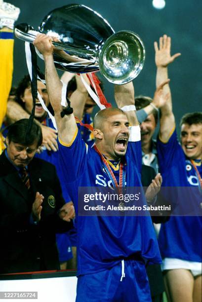 Gianluca Vialli of Juventus celebrates the victory with the trophy after the UEFA Champions League 1995-1996 match between Ajax and Juventus at...