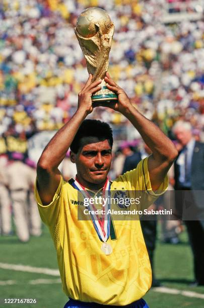 Romário de Souza Faria of Brazil lift the trophy after winnigs the Final FIFA World Cup 1994 match between Brazil and Italy at Rose Bowl on July 17,...