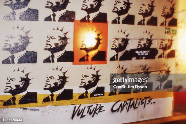 Mural of Vladimir Lenin with a Mohican titled ‘Vulture Capitalists’ by artist Banksy is pictured at an exclusive Graffiti Party in the underground...