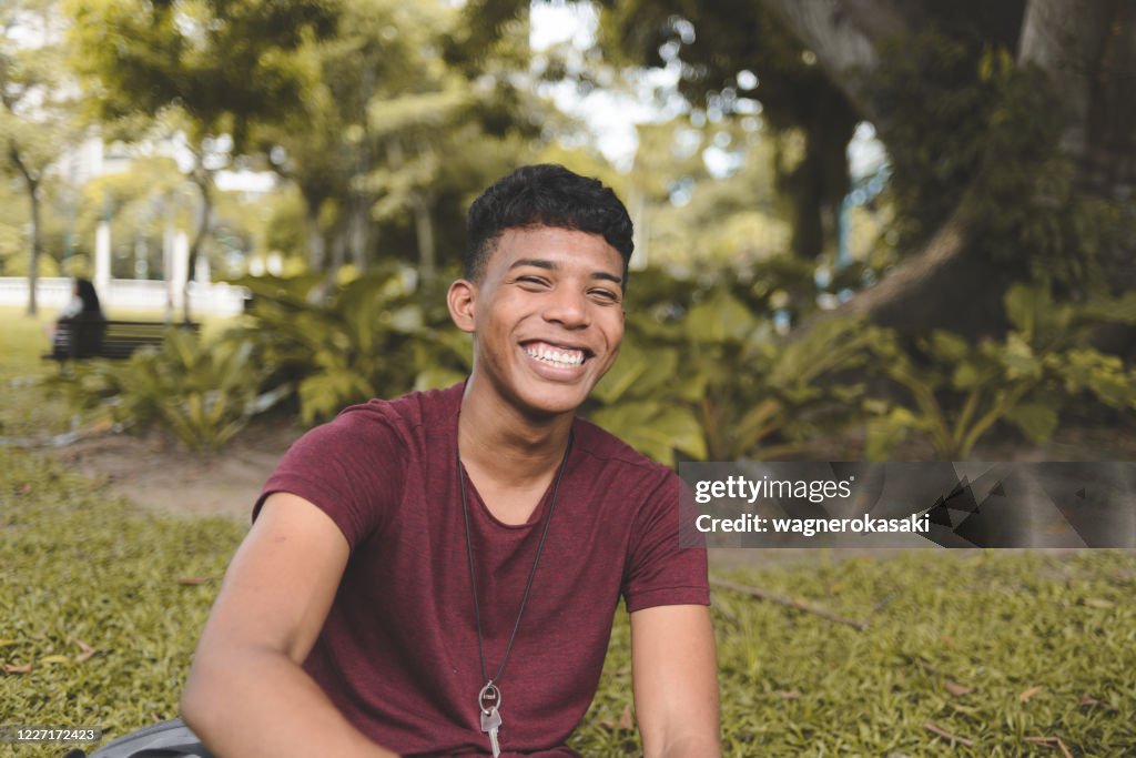 Portrait of brazilian young man looking at camera