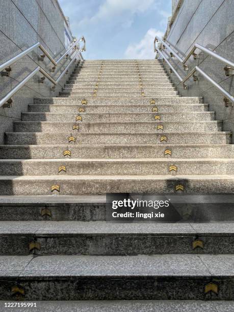 steps at the entrance and exit of the subway station - metro mall stock-fotos und bilder