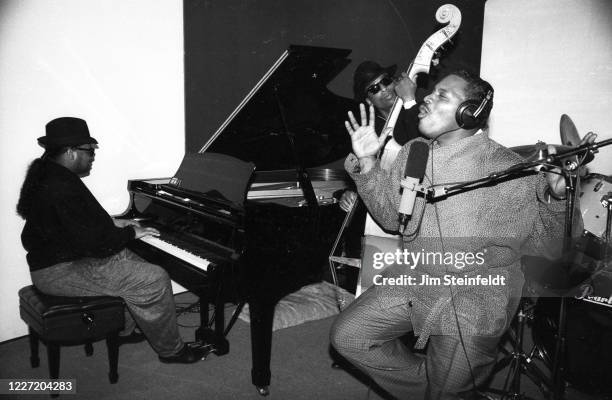 Singer Alexander O'Neal during a recording session with Jimmy Jam on piano and Terry Lewis on bass in Minneapolis, Minnesota in 1988.