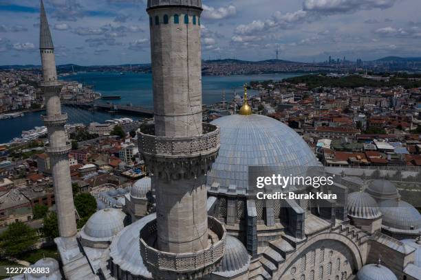 In this image taken with a drone - Istanbul's famous Suleymaniye Mosque is seen on the last day of the Muslim holiday of Eid al-Fitr during a...