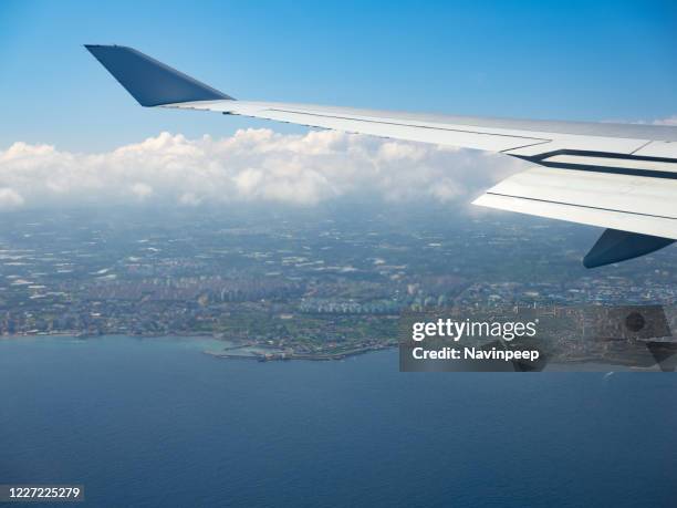 view from the plane, cloud land and water, jeju island, south korea - jeju island stock pictures, royalty-free photos & images