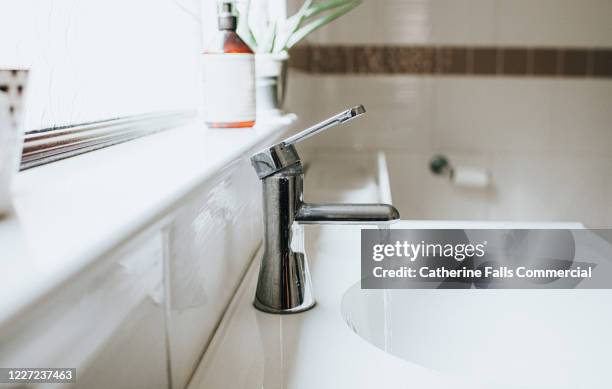 bathroom sink - bathroom sink stock pictures, royalty-free photos & images