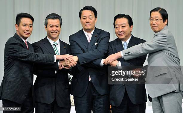 Candidates for Democratic Party of Japan presidential Election Seiji Maehara, Sumio Mabuchi, Banri Kaieda, Yoshihiko Noda and Michihiko Kano shake...