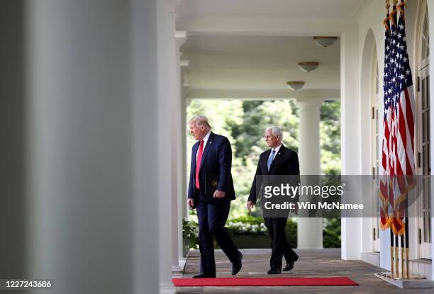 President Donald Trump and Vice president Mike Pence arrive for an event on protecting seniors with diabetes, in the Rose Garden at the White House...