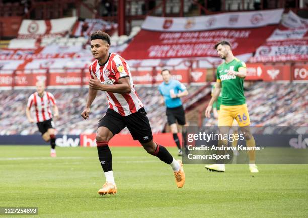 Brentford's Ollie Watkins celebrates scoring his side's first goal during the Sky Bet Championship match between Brentford and Preston North End at...