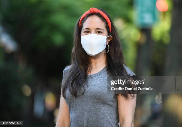 Dana Leigh Smith-Grubow seen wearing a Chaser top, Madewell earrings, J. Crew headband and a Henry Mask protective mask during the coronavirus...