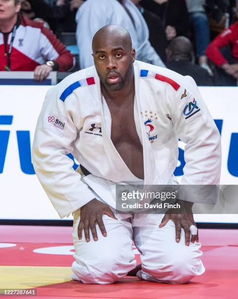 Olympic and World champion, Teddy Riner of France rises from the mat after holding Stephan Hegyi of Austria for an ippon to win their second round...