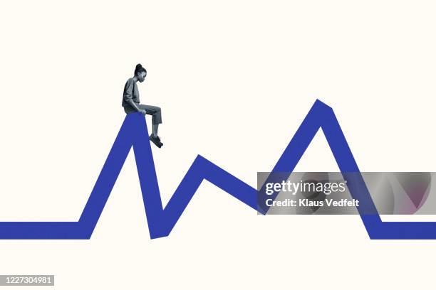 side view of young woman sitting blue line graph - mix photo illustration stock-fotos und bilder