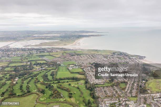 aerial view of coastline of dublin - dublin aerial stock pictures, royalty-free photos & images