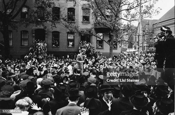 Former US Attorney General Robert F Kennedy waves to a crowd of largely Hasidic supporters during his US senatorial campaign on Bedford Avenue in...