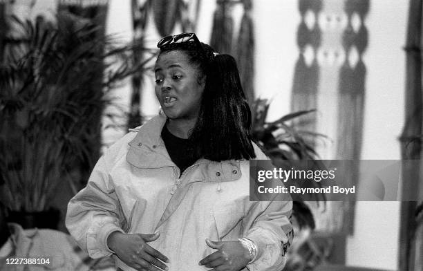 Rap artist Sister Souljah speaks to a youth group in Chicago, Illinois in May 1992.