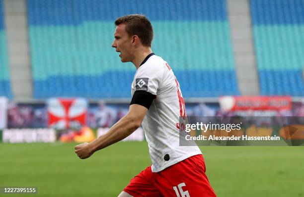 Lukas Klostermann of Leipzig celebrates after he heads the equalizing goal during the Bundesliga match between RB Leipzig and Hertha BSC at Red Bull...